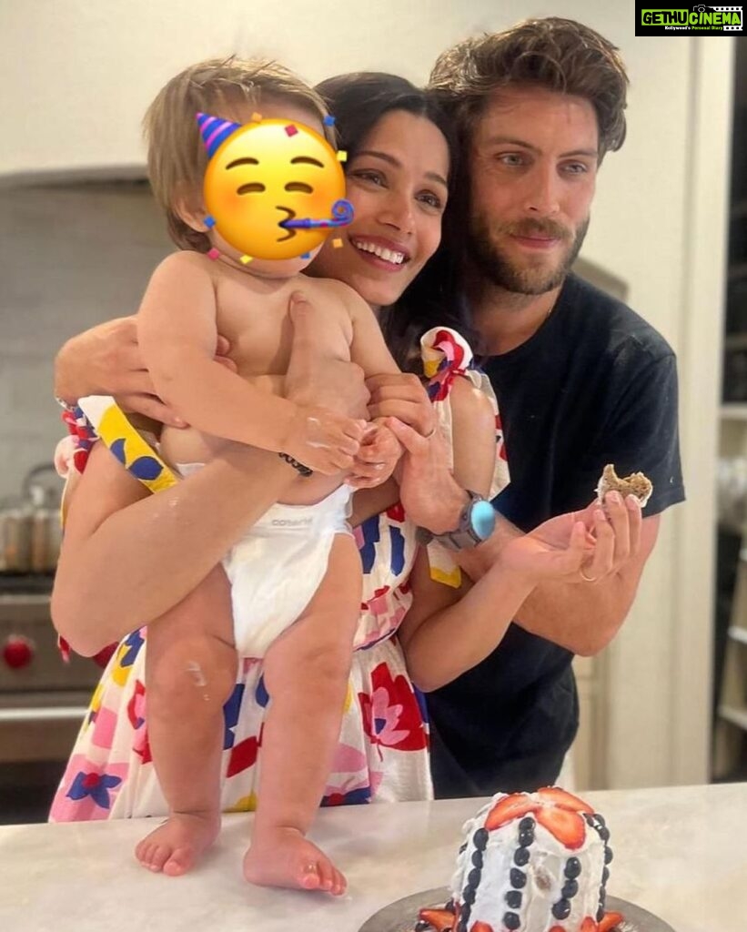 Freida Pinto Instagram - On October 28, my little Rumi-Ray turned 1! My instinct was to stay present and savour every minute of the feeling, celebrating and holding tight to the milestone. Celebrating the incredible growth Rumi has gone through, the adventures the three of us as a family have been through, and completing my first year of being a mother. We spent the weekend away with the family around the campfire. I tried my hand at baking a “smash cake” which turned out not to be very smash-able… but alas maybe next year I’ll give it another go. Rumi's gorgeous great-grandmother introduced us to Thoi Noi (a Vietnamese first birthday tradition), where little Rumi gleefully went straight for the tennis ball, tried his luck with the calculator, and pivoted to the ruler but decided on a computer mouse and calculator combo. Maybe that was his way of telling us - I have many interests and I am dynamic. I like that for Rumi. I was so grateful my wonderful sister @sharonfpinto (Rumi's godmother) and my parents were able to come from India to join us in celebrating. @preetidesai (also Rumi's godmother) kept us all in splits with her wicked sense of humour. @coryt wonderful parents, aunt, and cousins were all there to bless this lucky little boy who gets to boast of being part Indian, part American, and part Vietnamese. For the icing on the cake... Rumi and I got to romp around in our matching PJs (a tradition I will continue as long as he will let me). My heart is so content and I wanted to share a little piece of my happiness with all of you.