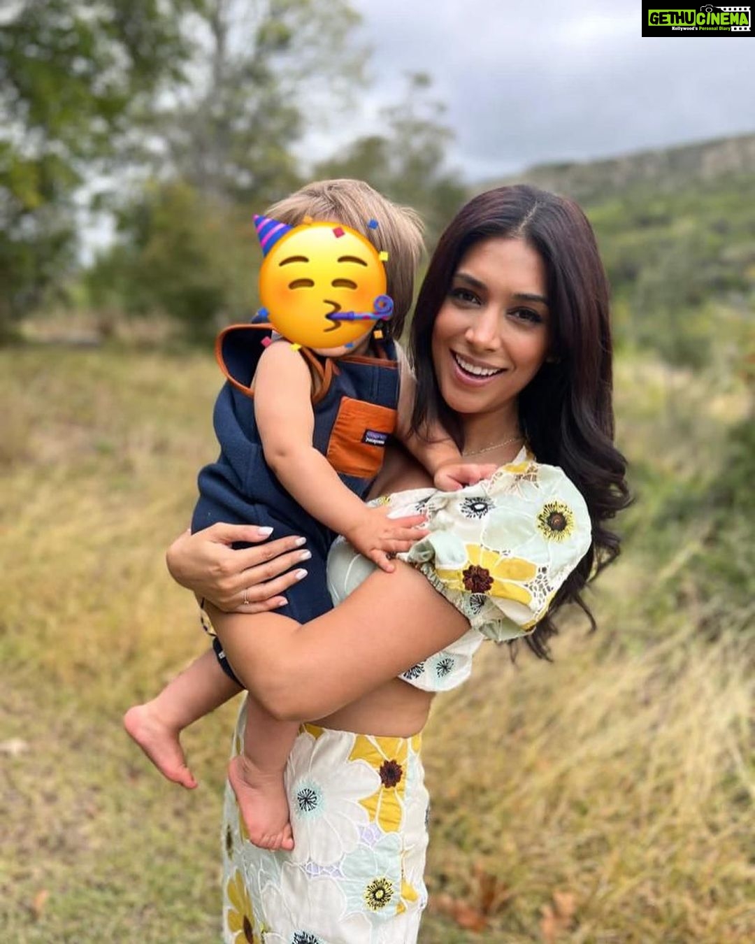 Freida Pinto Instagram - On October 28, my little Rumi-Ray turned 1! My instinct was to stay present and savour every minute of the feeling, celebrating and holding tight to the milestone. Celebrating the incredible growth Rumi has gone through, the adventures the three of us as a family have been through, and completing my first year of being a mother. We spent the weekend away with the family around the campfire. I tried my hand at baking a “smash cake” which turned out not to be very smash-able… but alas maybe next year I’ll give it another go. Rumi's gorgeous great-grandmother introduced us to Thoi Noi (a Vietnamese first birthday tradition), where little Rumi gleefully went straight for the tennis ball, tried his luck with the calculator, and pivoted to the ruler but decided on a computer mouse and calculator combo. Maybe that was his way of telling us - I have many interests and I am dynamic. I like that for Rumi. I was so grateful my wonderful sister @sharonfpinto (Rumi's godmother) and my parents were able to come from India to join us in celebrating. @preetidesai (also Rumi's godmother) kept us all in splits with her wicked sense of humour. @coryt wonderful parents, aunt, and cousins were all there to bless this lucky little boy who gets to boast of being part Indian, part American, and part Vietnamese. For the icing on the cake... Rumi and I got to romp around in our matching PJs (a tradition I will continue as long as he will let me). My heart is so content and I wanted to share a little piece of my happiness with all of you.