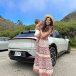 Freida Pinto Instagram - Let’s title this one trying to take a photo with your baby — they don’t sit still. Thank you @kiausa for letting us try out your fabulous EV6 over Monterey Car Week! Carmel by the Sea