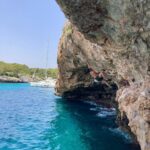 Freida Pinto Instagram - Blue as far as the eye can see… Plus Cory climbing (and jumping) off the cliff face. Mallorca