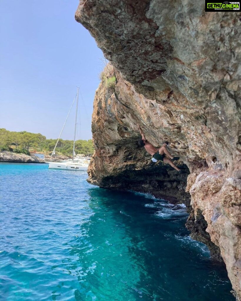 Freida Pinto Instagram - Blue as far as the eye can see… Plus Cory climbing (and jumping) off the cliff face. Mallorca