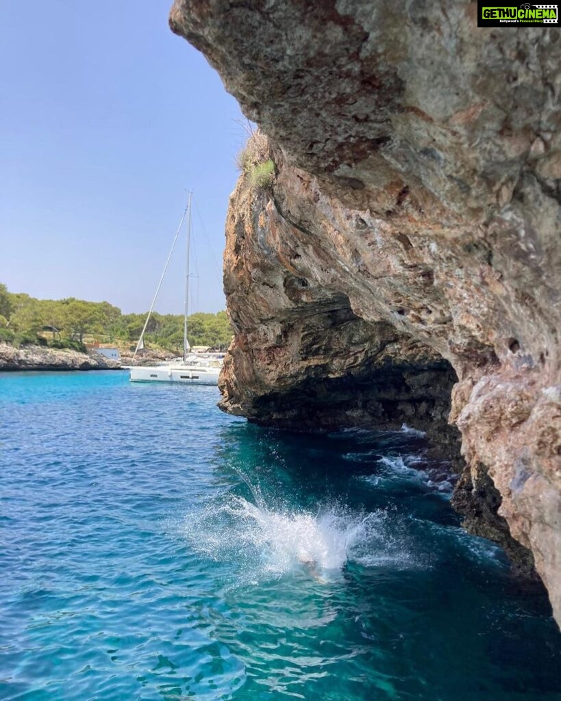 Freida Pinto Instagram - Blue as far as the eye can see… Plus Cory climbing (and jumping) off the cliff face. Mallorca