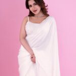 Iswarya Menon Instagram - For the love of wHiTe 🤍 . 📷 @shareefnandyala Styled by - @_akhiladasari Wearing - @sonaakshiraaj Jewellery - @alluringaccessories.a2 M&H - @glitterzmakeupstudiomakeup @shoaibs_art @ravi_deva987