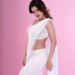 Iswarya Menon Instagram - For the love of wHiTe 🤍 . 📷 @shareefnandyala Styled by - @_akhiladasari Wearing - @sonaakshiraaj Jewellery - @alluringaccessories.a2 M&H - @glitterzmakeupstudiomakeup @shoaibs_art @ravi_deva987