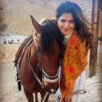 Iswarya Menon Instagram – The first time I ever spoke to a horse 🥺❤️
Do you believe in animal communication? I do!
I do that with @coffeemenon every single time 🥺
They understand every emotion, every thought of yours, you can talk to them telepathically.
One such experience was with this horse 🥺❤️
.
In Petra, jordan. My shoes broke on the way , it was a long way back to my hotel .. and the pathway was full of rocks, so it was impossible for me to walk barefoot back to the hotel .
I happened to ride on this particular horse ..
He kept halting on the way, showing his disinterest in walking. He kept nodding his head to his owner and refused to move!
I got down , requested him to help me, explained my situation, spoke to him eye to eye , gave him a hug 🥺
& on my request he walked without halting all the way for me 😞❤️ 
This blew my mind!
Are we human beings as empathetic as they are ?