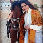 Iswarya Menon Instagram – The first time I ever spoke to a horse 🥺❤️
Do you believe in animal communication? I do!
I do that with @coffeemenon every single time 🥺
They understand every emotion, every thought of yours, you can talk to them telepathically.
One such experience was with this horse 🥺❤️
.
In Petra, jordan. My shoes broke on the way , it was a long way back to my hotel .. and the pathway was full of rocks, so it was impossible for me to walk barefoot back to the hotel .
I happened to ride on this particular horse ..
He kept halting on the way, showing his disinterest in walking. He kept nodding his head to his owner and refused to move!
I got down , requested him to help me, explained my situation, spoke to him eye to eye , gave him a hug 🥺
& on my request he walked without halting all the way for me 😞❤️ 
This blew my mind!
Are we human beings as empathetic as they are ?