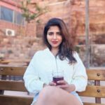 Iswarya Menon Instagram – Sipping on black tea infront of this picturesque view ☕️