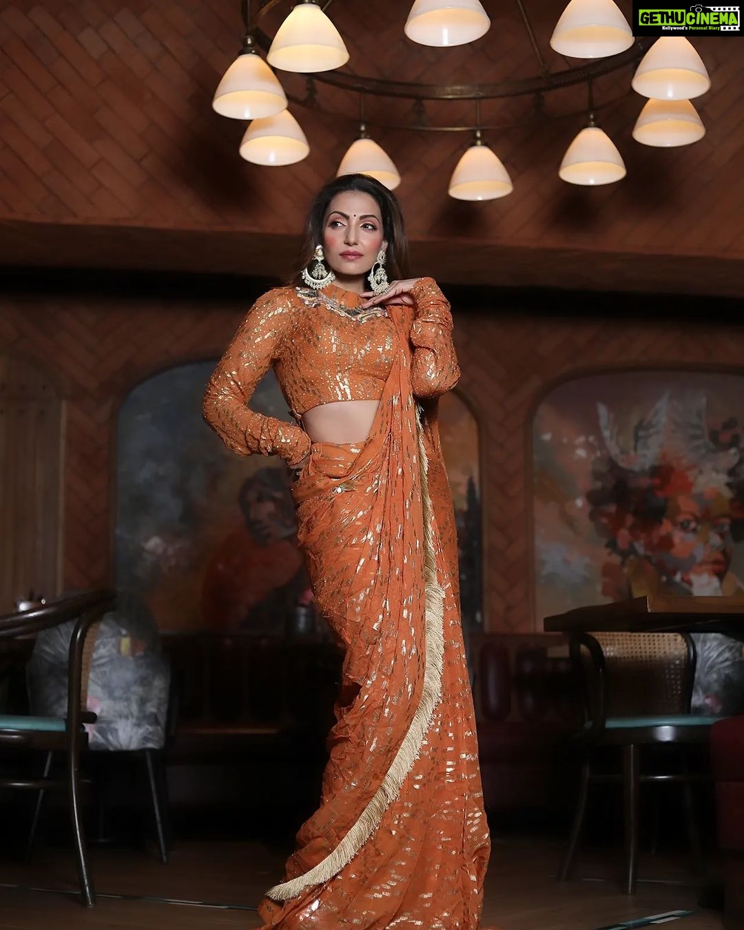Navina Bole Instagram - Not looking for my jhumkas coz they are right here💥🧡 Photograher: @portraitdeewana Stylist: @style_deintrepide Outfit: @arpitasulakshana Makeup: @rouge_makeovers Hair: @ayushiiijainnn Location: @1522inmumbai #pics #picsoftheday #photos #photosoftheday #newpost #newpics #explorepage #explore #navinabole #saree #sareenotsorry #ootd #ethnicwear #jewellery #deckedup #rustorange #designerwear #fashionshoot #commercialphotography #omsairam #positivevibes #instapost #instapics📷 #instagram #instagood #happywednesday #keepswiping 1522 Mumbai