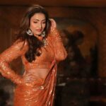 Navina Bole Instagram - Not looking for my jhumkas coz they are right here💥🧡 Photograher: @portraitdeewana Stylist: @style_deintrepide Outfit: @arpitasulakshana Makeup: @rouge_makeovers Hair: @ayushiiijainnn Location: @1522inmumbai #pics #picsoftheday #photos #photosoftheday #newpost #newpics #explorepage #explore #navinabole #saree #sareenotsorry #ootd #ethnicwear #jewellery #deckedup #rustorange #designerwear #fashionshoot #commercialphotography #omsairam #positivevibes #instapost #instapics📷 #instagram #instagood #happywednesday #keepswiping 1522 Mumbai
