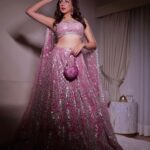 Nitibha Kaul Instagram – Living my Indian Barbiecore dreams in  @falgunishanepeacockindia 💕 for the opening of @fdciofficial Couture Week ✨

Earrings @amamajewels 
Bag @douxamourindia 
MUA @shivolidogra_makeupartist 
Hair @hairgoalsbyjaya 
📷 @jayshootin_ 

#FalguniShanePeacock #IndiaCoutureWeek #Barbiecore #PinkLehenga #BridalCouture #PinkAesthetic Delhi, India