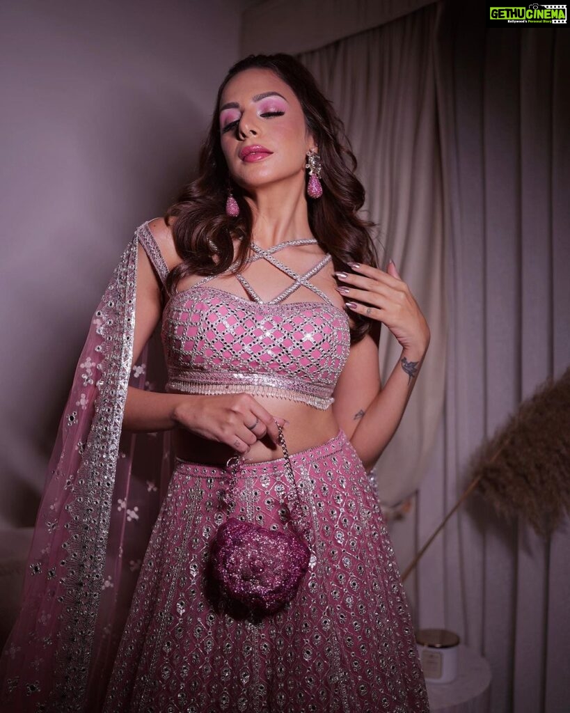 Nitibha Kaul Instagram - Living my Indian Barbiecore dreams in @falgunishanepeacockindia 💕 for the opening of @fdciofficial Couture Week ✨ Earrings @amamajewels Bag @douxamourindia MUA @shivolidogra_makeupartist Hair @hairgoalsbyjaya 📷 @jayshootin_ #FalguniShanePeacock #IndiaCoutureWeek #Barbiecore #PinkLehenga #BridalCouture #PinkAesthetic Delhi, India