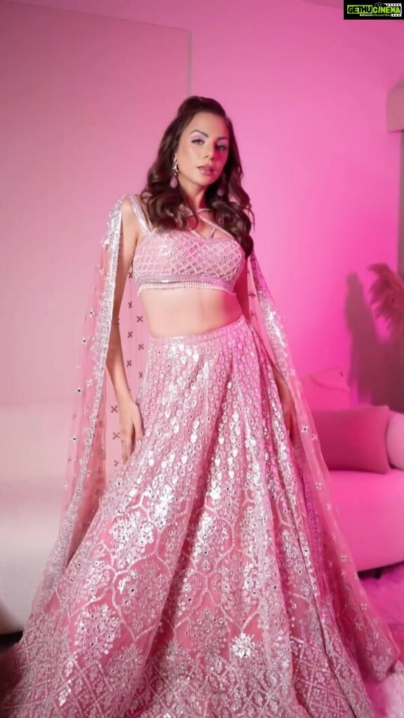 Nitibha Kaul Instagram - My take on the Indian Barbie 🎀 Save this audio for your Desi Barbie transitions 💓 Outfit @falgunishanepeacockindia Earrings @amamajewels Bag @douxamourindia MUA @shivolidogra_makeupartist Hair @hairgoalsbyjaya Video @jayshootin_ #DesiBarbie #BarbieCore #PinkLehenga #FalguniShanePeacock #IndianCouture #PinkOutfit #WeddingCouture #PinkAesthetic