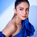Rakul Preet Singh Instagram - Blues 💙 for #bigbossott #iloveyou now on #jiocinemas Outfit @pinkoofficial x @toscanifashionhouse Earrings @bblinggbymeghana Rings @misho_designs Heels @mvpwardrobe Styled by @anshikaav Assisted by @roshiijain @bhatia_tanisha Makeup @im__sal Assisted by @im.saklen Hair @aliyashaik28 Shot by @kaasastudio
