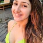 Sayyeshaa Saigal Instagram - Water baby!! Splash …splash! ❤️🐬🌅 #swimming#splash#love#waterbaby#metime#rejuvenate#calming#instagood#swimwear#instagood