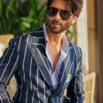 Shahid Kapoor Instagram - BLUE DADDY Shot by: @mayank_mudnaney Makeup: @james_gladwin_ Makeup assistant: @mahendra.kanojia Hair by: @aalimhakim Hair assistant: @shahrukhshaikh9519 Outfit: @snbyshantanunikhil Sunglasses: @prada @turakhiaopticians Style by: @styledbychandani @style.cell Style team: @thecrazy_fattygirl Dressman: @thebombaydressman Managed by: @chanchal_dsouza Digital agency: @59thparallel Security: @parvez_pzee PR agency: @think_talkies