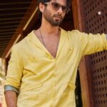 Shahid Kapoor Instagram – BLOODY sunny ☀️ 

Shot by: @mayank_mudnaney 
Makeup: @james_gladwin_ 
Makeup assistant: @mahendra.kanojia 
Hair by: @aalimhakim
Hair assistant: @shahrukhshaikh9519 
Jacket: @jatinmalikcouture 
Style by: @theanisha
Dressman: @thebombaydressman 
Managed by: @chanchal_dsouza 
Digital agency: @59thparallel 
Security: @parvez_pzee 
PR agency: @think_talkies