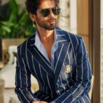 Shahid Kapoor Instagram - BLUE DADDY Shot by: @mayank_mudnaney Makeup: @james_gladwin_ Makeup assistant: @mahendra.kanojia Hair by: @aalimhakim Hair assistant: @shahrukhshaikh9519 Outfit: @snbyshantanunikhil Sunglasses: @prada @turakhiaopticians Style by: @styledbychandani @style.cell Style team: @thecrazy_fattygirl Dressman: @thebombaydressman Managed by: @chanchal_dsouza Digital agency: @59thparallel Security: @parvez_pzee PR agency: @think_talkies