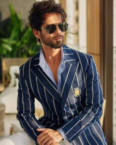 Shahid Kapoor Instagram - BLUE DADDY

Shot by: @mayank_mudnaney 
Makeup: @james_gladwin_ 
Makeup assistant: @mahendra.kanojia 
Hair by: @aalimhakim
Hair assistant: @shahrukhshaikh9519 
Outfit: @snbyshantanunikhil
Sunglasses: @prada @turakhiaopticians
Style by: @styledbychandani @style.cell 
Style team: @thecrazy_fattygirl
Dressman: @thebombaydressman 
Managed by: @chanchal_dsouza 
Digital agency: @59thparallel 
Security: @parvez_pzee 
PR agency: @think_talkies