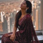 Soundariya Nanjundan Instagram - When the view from Burj Khalifa is breathtaking, but so is your saree ♥️ 🗼 Feeling proud of my heritage and my fashion choices! because sometimes you need to add a little spice to your life😉 🗼 "Bringing a touch of tradition to Burj Khalifa - saree style" 📸- @bhoopalm_official Styledbyme ✨ 🗼 🗼 🗼 🗼 #soundariyananjundan #burjkhalifa #dubai #uae #dubaimall #dubailife #mydubai #travelphotography #model #abudhabi #dubaifashion #emirates #jumeirah #visitdubai #chennai #dubai🇦🇪 #photography #travel #dubailifestyle #palmjumeirah #saree #blogger #fashion #dubailuxury #dubailife #dubaistyle #burjkhalifadubai #travelblogger #love #instagood #fashionmodel At the Top, Burj Khalifa