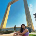 Soundariya Nanjundan Instagram - The Dubai Frame is the ultimate game of hide-and-seek - except you can't really hide behind a frame that big🤭 💜 📸- @bhoopalm_official Outfit- @hm 💼- @guess #styledbyme 💜 💜 💜 💜 💜 💜 #soundariyananjundan #dubaiframe #dubai #uae #dubailife #love #fashion #instagram #instagood #india #travel #photography #dubaifashion #dubailifestyle #uae🇦🇪 #kannadiga #chennai #outfit #followforfollowback #likesforlike #instalike #travelphotography #destination #purple #ootd #photography #fashionblogger #blogger #influencer #model