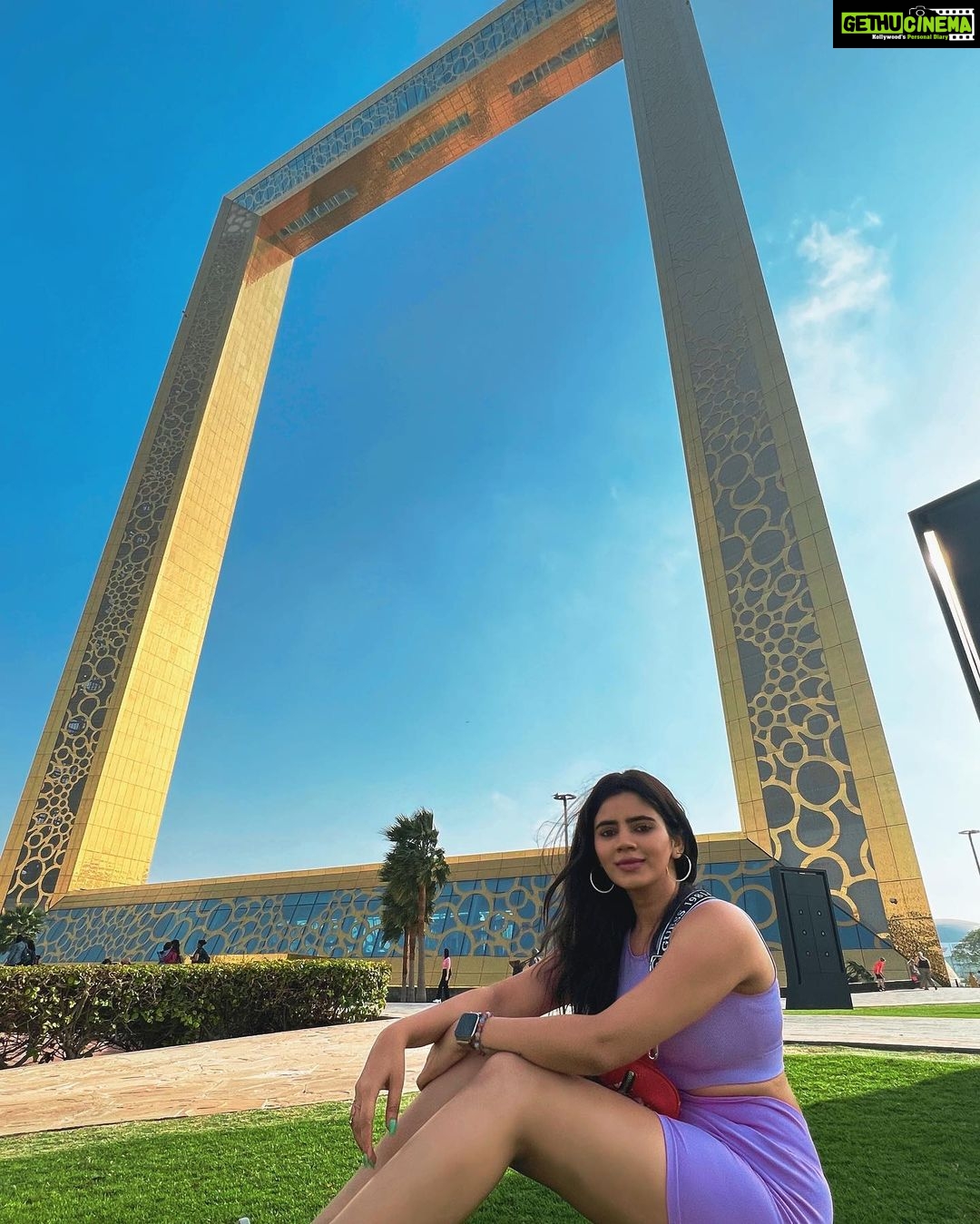 Soundariya Nanjundan Instagram - The Dubai Frame is the ultimate game of hide-and-seek - except you can't really hide behind a frame that big🤠💜 📸- @bhoopalm_official Outfit- @hm 💼- @guess #styledbyme 💜 💜 💜 💜 💜 💜 #soundariyananjundan #dubaiframe #dubai #uae #dubailife #love #fashion #instagram #instagood #india #travel #photography #dubaifashion #dubailifestyle #uae🇦🇪 #kannadiga #chennai #outfit #followforfollowback #likesforlike #instalike #travelphotography #destination #purple #ootd #photography #fashionblogger #blogger #influencer #model