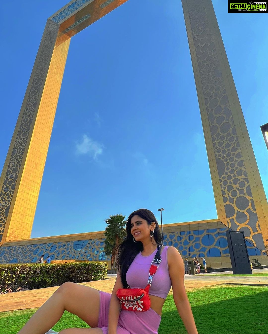 Soundariya Nanjundan Instagram - The Dubai Frame is the ultimate game of hide-and-seek - except you can't really hide behind a frame that big🤭 💜 📸- @bhoopalm_official Outfit- @hm 💼- @guess #styledbyme 💜 💜 💜 💜 💜 💜 #soundariyananjundan #dubaiframe #dubai #uae #dubailife #love #fashion #instagram #instagood #india #travel #photography #dubaifashion #dubailifestyle #uae🇦🇪 #kannadiga #chennai #outfit #followforfollowback #likesforlike #instalike #travelphotography #destination #purple #ootd #photography #fashionblogger #blogger #influencer #model