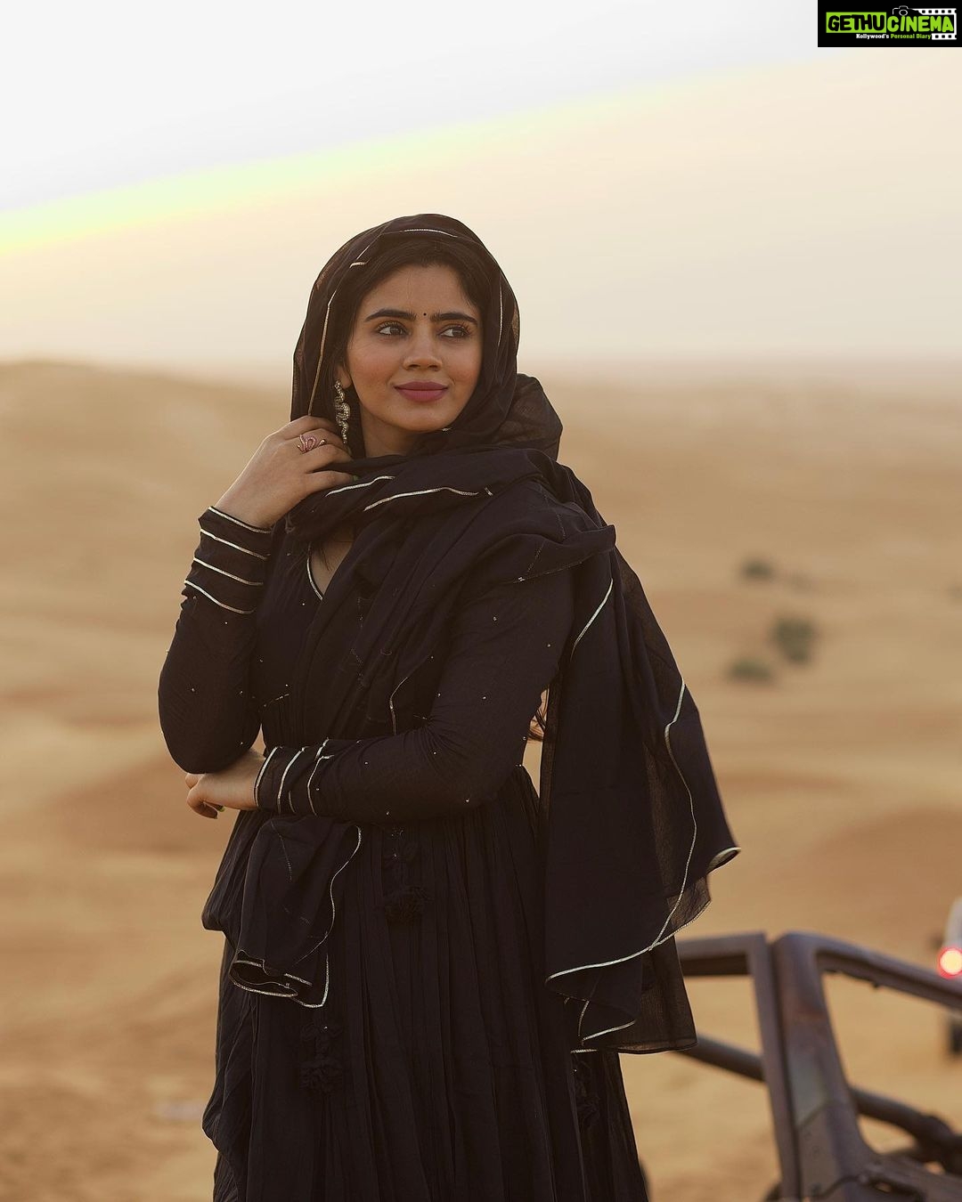 Soundariya Nanjundan Instagram - The last one from the black dress series🤭... until I discover a new pair of black dress😉! . #BlackForever" 🏜️ 📸- @bhoopalm_official 🐪 🐪 🐪 🐪 🐪 🐪 #soundariyananjundan #desert #travel #nature #photography #desertlife #travelphotography #adventure #instalike #love #instadaily #sunset #dubai #photooftheday #instagood #sahara #instagood #followforfollowback #art #travelgram #sand #explore #naturephotography #uae #model #mountains #wanderlust #photo #instagram #desertvibes