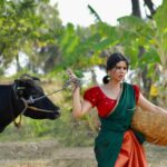 Soundariya Nanjundan Instagram - In the company of cows, discovering the heartwarming charm of the village🌳🐄 🍃 Outfit- @ekantastudio 🎥- @bhoopalm_official Styledbyme🍁 🌱 🌱 🌱 #JoshMeinAaja @officialjoshapp @joshapp.tamil 🌱 #soundariyananjundan #bangalore #village #nature #photography #travel #villagelife #naturephotography #love #photooftheday #india #instagram #travelphotography #soundarya #instagood #summer #photo #sky #mountains #beautiful #picoftheday #naturelovers #art #life #instagood #instalike #southindian #indiangirl Bangalore, India