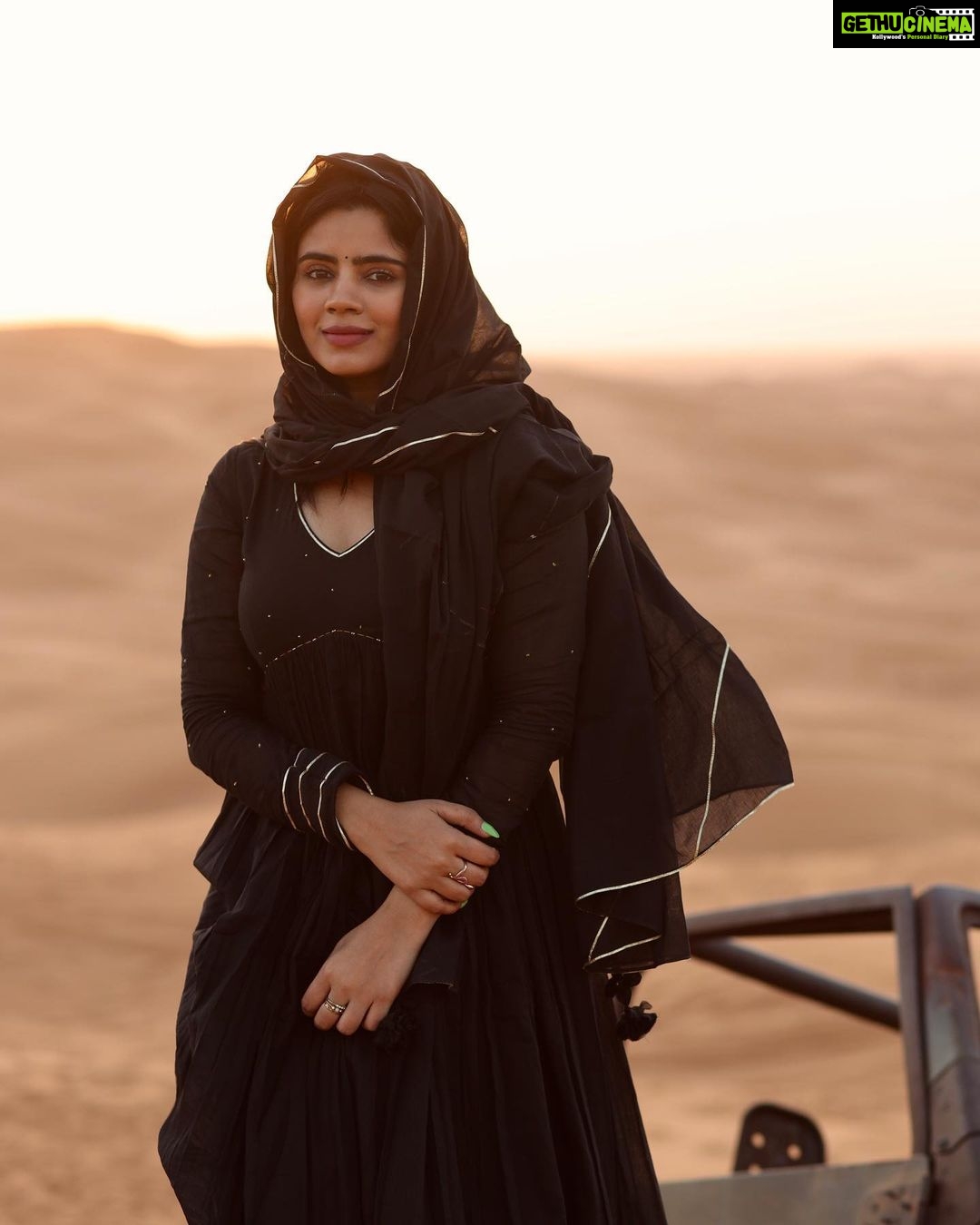 Soundariya Nanjundan Instagram - The last one from the black dress series🤭... until I discover a new pair of black dress😉! . #BlackForever" 🏜️ 📸- @bhoopalm_official 🐪 🐪 🐪 🐪 🐪 🐪 #soundariyananjundan #desert #travel #nature #photography #desertlife #travelphotography #adventure #instalike #love #instadaily #sunset #dubai #photooftheday #instagood #sahara #instagood #followforfollowback #art #travelgram #sand #explore #naturephotography #uae #model #mountains #wanderlust #photo #instagram #desertvibes