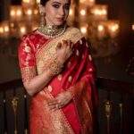 Aarthi Instagram – There is a goddess within each of us. 
Only a red saree can ascertain that. 
.
.
.
.
.
.
.
.
.
.
#weddingseason #glamitup #blingiton #sareelove #indianfashion #bigfatindianweddings #familytime #glamtribe
🥻 @sabyasachiofficial 
💎 @amrapalijewels @mangatrai36jubileehills 
💄 @leiyamua @dolma.tamang 
📸 @kiransaphotography 
🧍🏻‍♀️ @anitha.cookie @nasima28
