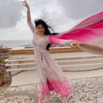 Adah Sharma Instagram - Gone with the wind …. Before we won awards we did pictures on the terrace in the morning (there was so much wind the sleeves flew away by the time I reached the award event 😅) 💁@snehal_uk 💃@juhi.ali @neeta_lulla @houseofneetalulla @kushalsfashionjewellery 💨 💨 💨 P.S. didn't want to ruin my heels in the rain toh nagey pair did pics . But you know what happened to the heels anyway 👀 #100YearsOfAdahSharma #adahsharma