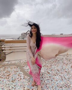 Adah Sharma Instagram - Gone with the wind …. 
Before we won awards we did pictures on the terrace in the morning (there was so much wind the sleeves flew away by the time I reached the award event 😅)
💁@snehal_uk
💃@juhi.ali
@neeta_lulla @houseofneetalulla
@kushalsfashionjewellery
💨
💨
💨
P.S. didn't want to ruin my heels in the rain toh nagey pair did pics . But you know what happened to the heels anyway 👀
#100YearsOfAdahSharma #adahsharma