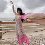 Adah Sharma Instagram - Gone with the wind …. Before we won awards we did pictures on the terrace in the morning (there was so much wind the sleeves flew away by the time I reached the award event 😅) 💁@snehal_uk 💃@juhi.ali @neeta_lulla @houseofneetalulla @kushalsfashionjewellery 💨 💨 💨 P.S. didn't want to ruin my heels in the rain toh nagey pair did pics . But you know what happened to the heels anyway 👀 #100YearsOfAdahSharma #adahsharma