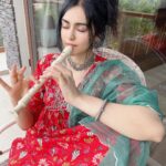 Adah Sharma Instagram - Guess the song I played and I’ll share the video 🐒👻 anddd guess where I am 🦅👻 @easemytrip comeonnnn use your psychic powers ! 👽💀👾 #100YearsOfAdahSharma #AdahSharmaxEaseMyTrip #flute #themountainsarecalling #themountainsandmeeee #thehillsarealivewiththesoundofmusicThisIsalreadtAnExiatingHashtag