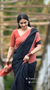 Aditi Ravi Instagram - find me . where dreams are lost in reality!!🖤❤️ 🎥 @pranavcsubash_photography saree @vrinda_sk_ mua @sreegeshvasan_makeupartist #reels #remixing #reelirfeelit #nostalgia #mohanlal #shobana #90s #90skid #trendingreels #music #malayalam