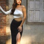 Alaya F Instagram - Always trying to catch the sun, even when it’s 35° outside 🥵🫠 Photos by @trishasarang Styled by @sanamratansi assisted by @ankitha_chauhan @sr_styleco Hair by @souravv_roy_ Make up by @divyashetty_ Outfit - @labelmanikananda Cuffs and rings - @rafthelabel