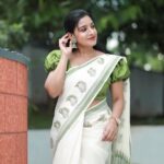 Alphy Panjikaran Instagram - krishna Janmashtami special 💚💚 @makeover_by_suresh_krishna @ar_handlooms_kuthampully @abnormal_grapher #picoftheday #krishna #janmashtami #special #saree #love #happiness #peaceful #life #instagram #instadaily