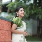 Alphy Panjikaran Instagram - krishna Janmashtami special 💚💚 @makeover_by_suresh_krishna @ar_handlooms_kuthampully @abnormal_grapher #picoftheday #krishna #janmashtami #special #saree #love #happiness #peaceful #life #instagram #instadaily