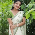 Alphy Panjikaran Instagram - krishna Janmashtami special 💚💚 @makeover_by_suresh_krishna @ar_handlooms_kuthampully @abnormal_grapher #picoftheday #krishna #janmashtami #special #saree #love #happiness #peaceful #life #instagram #instadaily