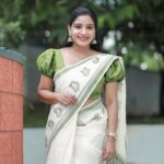 Alphy Panjikaran Instagram - krishna Janmashtami special 💚💚 @makeover_by_suresh_krishna @ar_handlooms_kuthampully @abnormal_grapher #picoftheday #krishna #janmashtami #special #saree #love #happiness #peaceful #life #instagram #instadaily