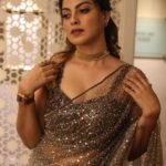 Anusree Instagram - The gorgeous @anusree_luv in a Saree by @t.and.msignature stunning neck piece by @m.o.dsignature Featuring a #sleeveless blouse enveloped in intricate #blooms. The entirety of this sheer drape is immersed in #beadwork & #sequins, creating a mesmerising visual effect !!Reflecting light with every movement, this ensemble shimmers gracefully enveloping the adorner in a tapestry of luminous charm . . Makeup @sajithandsujith Outfit @t.and.msignature Jewellery @m.o.dsignature Pic @mahesh_bhai . . . To know more, Contact: 0484-4043131 or WhatsApp: +91 94002 74705 . . . . . . . . . #Anusree #TandMsignature #tiyaneilkarikkassery #tandmbrides #partywears #ocassionwears #bridalwears