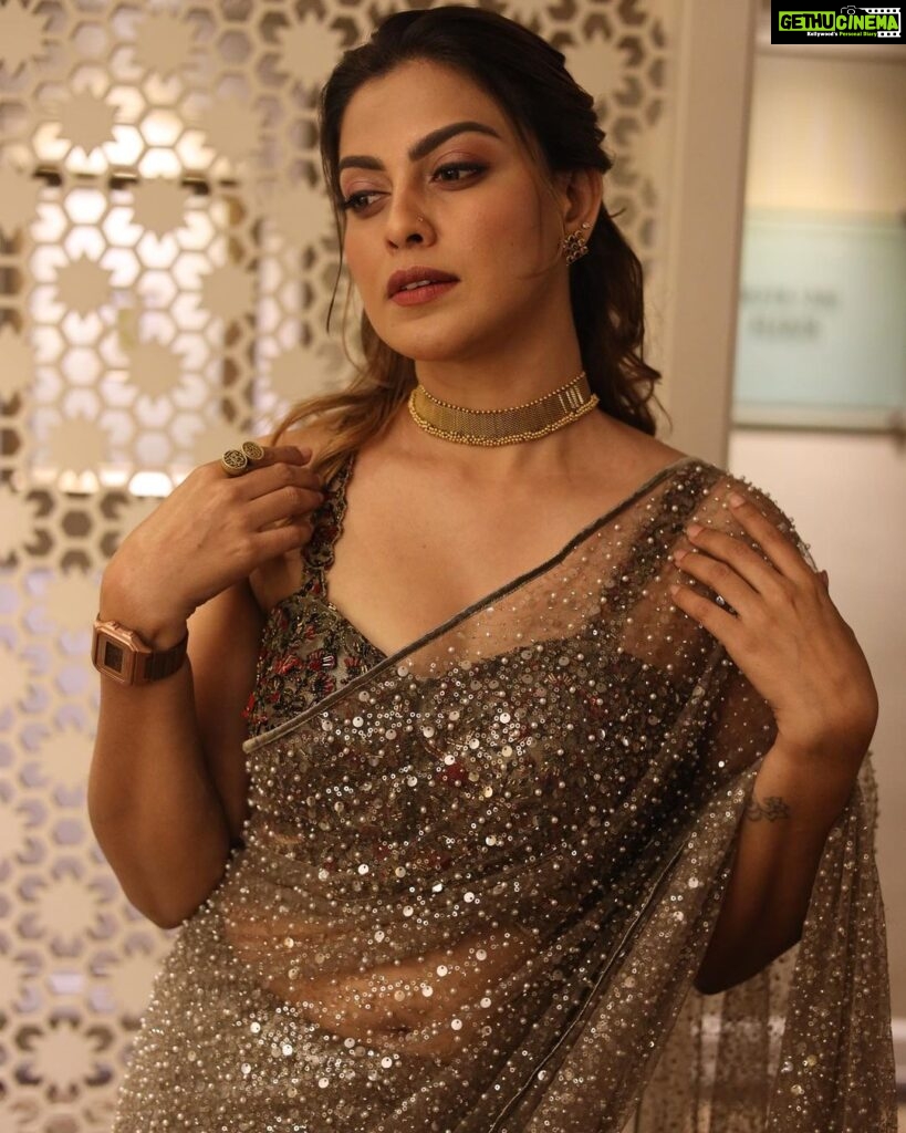 Anusree Instagram - The gorgeous @anusree_luv in a Saree by @t.and.msignature stunning neck piece by @m.o.dsignature Featuring a #sleeveless blouse enveloped in intricate #blooms. The entirety of this sheer drape is immersed in #beadwork & #sequins, creating a mesmerising visual effect !!Reflecting light with every movement, this ensemble shimmers gracefully enveloping the adorner in a tapestry of luminous charm . . Makeup @sajithandsujith Outfit @t.and.msignature Jewellery @m.o.dsignature Pic @mahesh_bhai . . . To know more, Contact: 0484-4043131 or WhatsApp: +91 94002 74705 . . . . . . . . . #Anusree #TandMsignature #tiyaneilkarikkassery #tandmbrides #partywears #ocassionwears #bridalwears