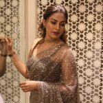Anusree Instagram - The gorgeous @anusree_luv in a Saree by @t.and.msignature stunning neck piece by @m.o.dsignature Featuring a #sleeveless blouse enveloped in intricate #blooms. The entirety of this sheer drape is immersed in #beadwork & #sequins, creating a mesmerising visual effect !!Reflecting light with every movement, this ensemble shimmers gracefully enveloping the adorner in a tapestry of luminous charm . . Makeup @sajithandsujith Outfit @t.and.msignature Jewellery @m.o.dsignature Pic @mahesh_bhai . . . To know more, Contact: 0484-4043131 or WhatsApp: +91 94002 74705 . . . . . . . . . #Anusree #TandMsignature #tiyaneilkarikkassery #tandmbrides #partywears #ocassionwears #bridalwears