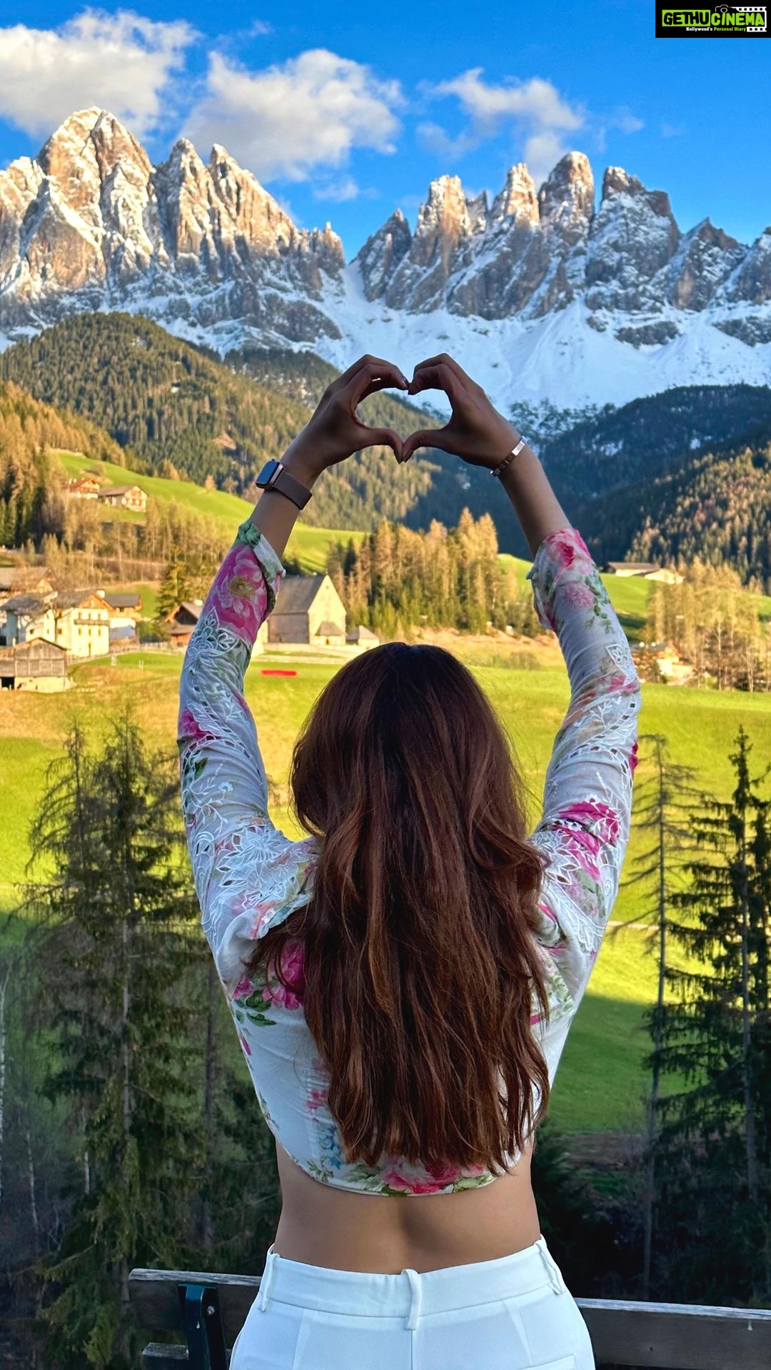 Arthi Venkatesh Instagram - If heaven was a place on earth, this might be it! The views are Un-freaking believable. After hours of grey, dark and gloomy weather, the skies parted, inviting me into the mighty Italian alps, in all their glory! 🏔️ Travel partner @gtholidays.in . . . . . #travel #europe #italy #dolomiti #dolomites #italian #alps #mountains #hike #beautiful #hereforview Dolomites, Italian Alps