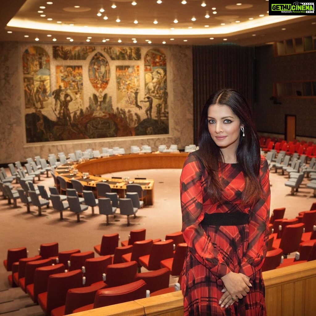 Celina Jaitly Instagram - Amidst my meetings for @free.equal at @unitednations HQ i always take a few moments to spend a few moments in this spectacular room which plays such an important role in our ongoing story. I have a strange feeling as I stand against the large mural by Norwegian artist, Per Lasson Krohg at the stunning Security Council Chamber at @unitednations HQ in #newyork, symbolizing the promise of future peace and individual freedom. This is a room that plays an important role in maintaining peace and stability in the world. The Security Council has primary responsibility for the maintenance of international peace and security. It has 15 Members, and each Member has one vote. Under the Charter of the United Nations, all Member States are obligated to comply with Council decisions. The Security Council takes the lead in determining the existence of a threat to the peace or act of aggression. It calls upon the parties to a dispute to settle it by peaceful means and recommends methods of adjustment or terms of settlement. In some cases, the Security Council can resort to imposing sanctions or even authorize the use of force to maintain or restore international peace and security. My grandfather and brother served on two such peace keeping missions which were a result of decisions that began here. It’s a honour to witness this thanks to my work journey with @charlesradcliffe @free.equal and my over two decade long journey with #lgbtq rights as an activist. #celinajaitly #celinapowell #unitednations #lgbtq🌈 #bollywood #indianactress #missindia #missuniverse #msuniverse #indianwomen #unwomen