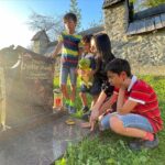 Celina Jaitly Instagram - ♥️HAPPY BIRTHDAY TO OUR ARTU♥️ Today our baby @arthurjhaag turned 6. My husband @haag.peter captured some beautiful moments today during our visit to the grave of @arthurjhaag s twin brother-baby Shamsher, whom we lost to a heart condition. Artu wanted his new pet Dinosaur to meet Shamsher on their birthday. The older twins @winstonjhaag & @viraajjhaag placed little cars on Shamsher’s grave leaving us all moist eyed. Todays birthday celebrations were bitter sweet but very blessed. A hike in the morning with his daddy followed by loads of icecream cake and treats. Artu also insisted on fulfilling his duty of donating toys that he does not play with anymore as per our family tradition as he had the opportunity to shop for new toys of his choice as his birthday present. Artu’s birthday is such a blessing for it is always a reminder to us of the fact that there is always a light at the end of a tunnel. As memories saturate my heart and the story spills from my eyes I am so grateful that I have lived to tell these stories. Remember courage is an accumulation of small steps… Our Artu did not only bring immense joy and laughter to my grief stricken moments but he also taught me that- “I can be changed by what happens to me. But I refuse to be reduced by it!! “ #celinajaitly #6thbirthday #arthurjhaag #twinsplusone #birthdayboy #celina #celinajaitley #bollywood #motivation #overcomingobstacles #missindia #missuniverse #austria #internationalfamily #indian Austria, Europe