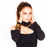 Elli AvrRam Instagram - She very much knew it all, but preferred observing from far.🐆 Outfit by : @clubllondon Jewellery by : @misho_designs Heels by : @publicdesire Styled by : @manekaharisinghani Makeup by @fab_beauty___ Hair by @arvindkumar_hair 📷 @tejasnerurkarr #hellohalloffameawards #hellomagazine #awards #elliavrram #yourstruly Mumbai, Maharashtra