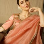 Elli AvrRam Instagram - Sarees have a separate spot in my closet and heart🤍 What about you? Saree - @raw_mango Earrings by - @avior.jewels rings by - @kharikajai Styled by- @juhi.ali Photographer - @nikhilshenoyphoto Makeup & Hair by - @jyotiiadvani.artistry @thakuramit190 #elliavrram #sareelove #desi #fashion #yourstruly