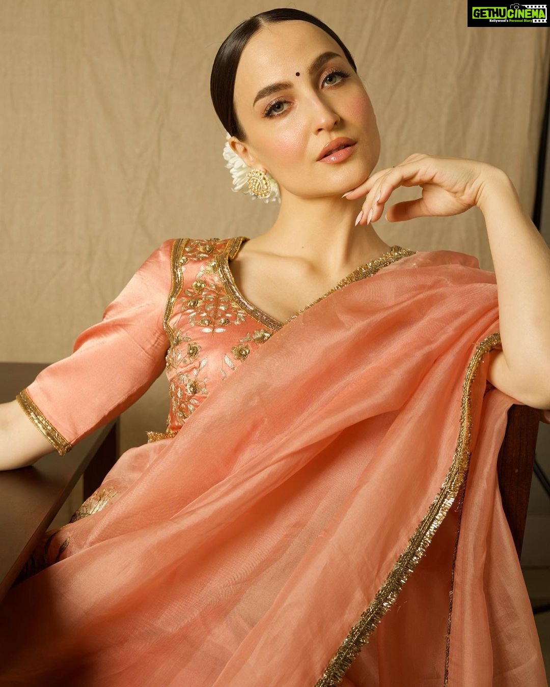 Elli AvrRam Instagram - Sarees have a separate spot in my closet and heartš¤ What about you? Saree - @raw_mango Earrings by - @avior.jewels rings by - @kharikajai Styled by- @juhi.ali Photographer - @nikhilshenoyphoto Makeup & Hair by - @jyotiiadvani.artistry @thakuramit190 #elliavrram #sareelove #desi #fashion #yourstruly