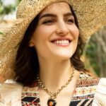 Elli AvrRam Instagram - And believe me when I say, this necklace has a long history❤️✨ Magazine: @culturedwedding Managing Editor: @yadav_manjeet Business Head: @divyanijain1925 Photographer: @nikhilshenoyphoto Outfit: @shopverb Hat: @myaraaindia Shoes: @melissashoesindia @sallyruchi Location: @theleelapalace_jaipur Co-ordinated by: @nadiiaamalik #elliavrram #yourstruly